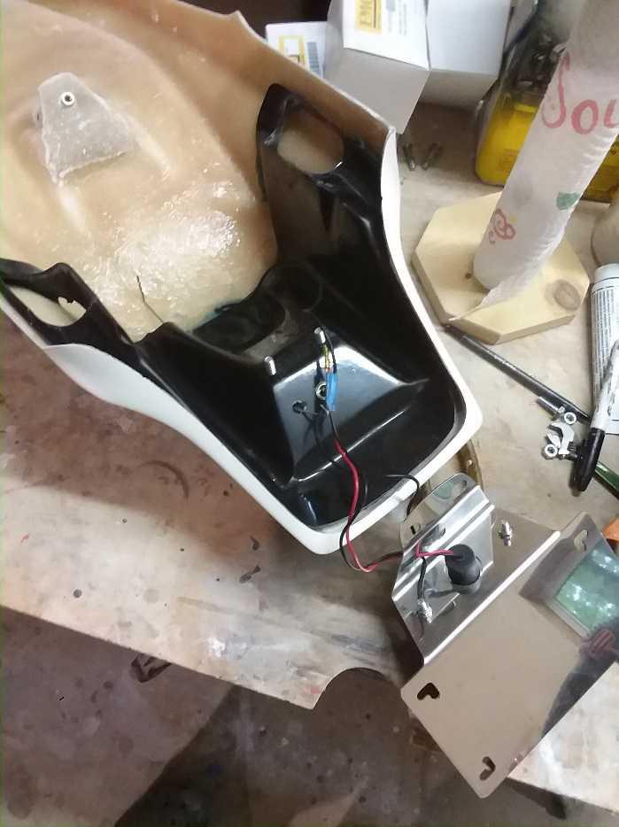 Fitting on 1994 to 2003 Frames Postion the tail on the frame and eyeball the seat rails poking out behind. How much to cut off? Maybe 7.