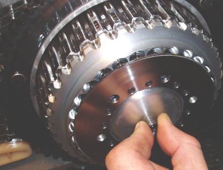 Checking that Retaining Ring is properly seated 30. You must ensure the Retaining Ring is snapped into the groove in the 8 center clutch posts.