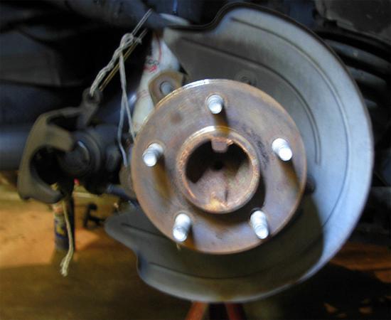 Wheel hub. Your car should look like this once you have the rotor off. 9. Clean both surfaces (front and back) of the new rotor with brake cleaner and paper towel.