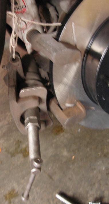 Brake compressor snugged onto piston. 15.