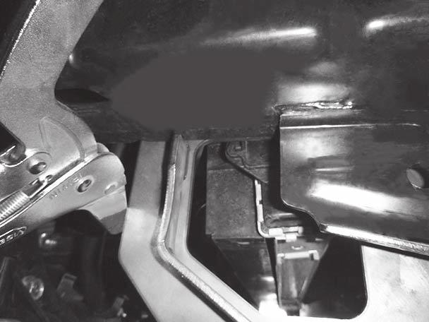 Using the three inner holes on both driver-side and passenger-side mounts as guides, drill three 17/32"