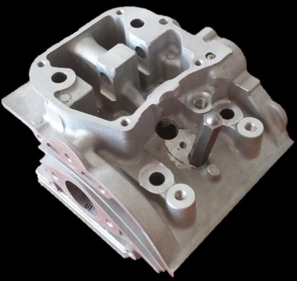 position because of the limitations of the cylinder head design, 1