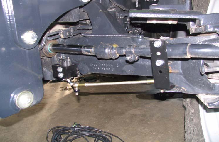 3.2 Mount Linkage Arm and Sensor Brackets Install the wheel angle sensor assembly on the left side of the front axle as shown below.