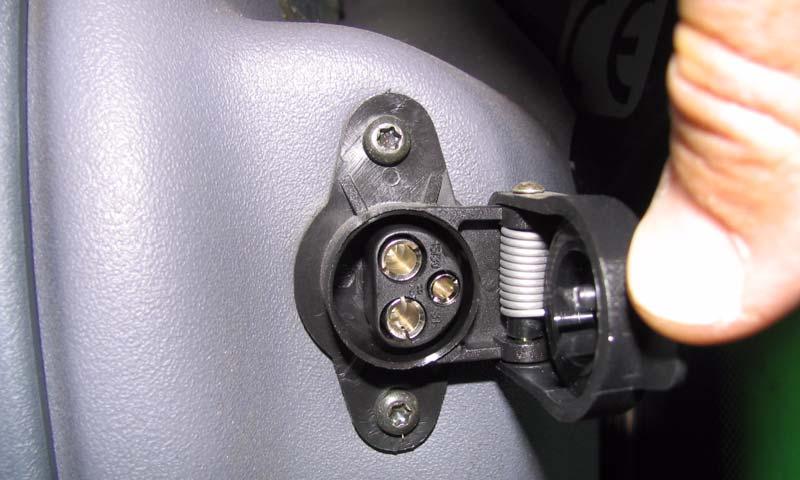 2 Attach the AutoFarm Power Cable to the Power Supply Outlet Inside Cab Use an adapter