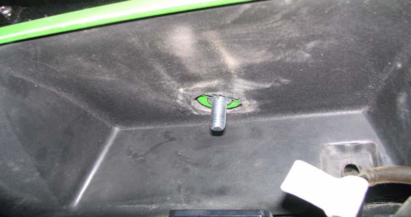 The lettered holes and the dummy cable connector must be on the left side of the tractor.