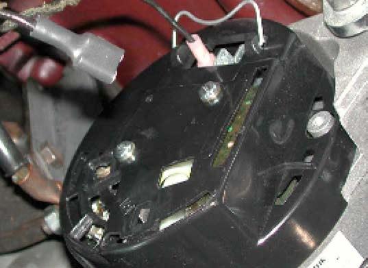 Attach the Brown/Yellow and Brown/Green wires to the leads on the back of the alternator.