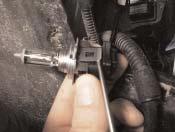 4 5 6 Use a small screwdriver to bend the fastening clamp as far as