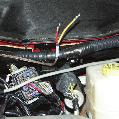 Run the Pyro cable along the brim of the engine bay so the end meets the end of the OutLook Main Harness and use zip ties to secure the line. 3.