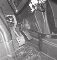FEATURES AND CONTROLS BRAKE PEDAL Depress the brake pedal to slow or stop the vehicle. Apply the brakes while starting the engine.