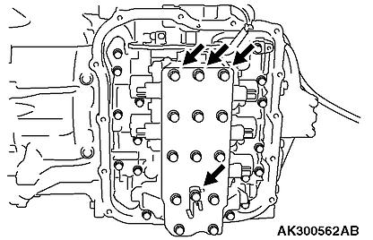 12. Disconnect the solenoid valve harness from the valve body by undoing the fluid temperature sensor and all the connectors.