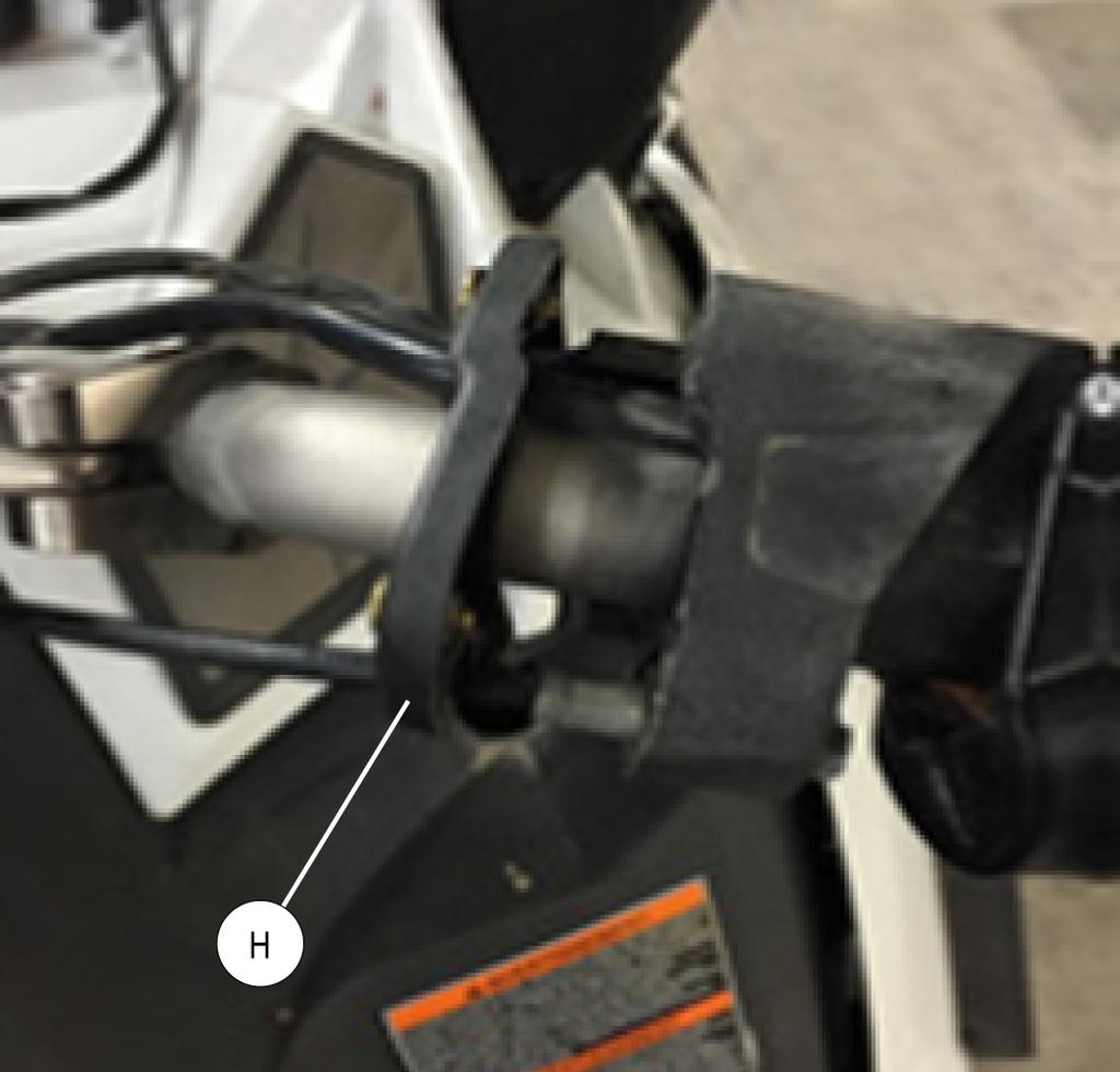 Loosen until you can move the attached base of throttle block inward.