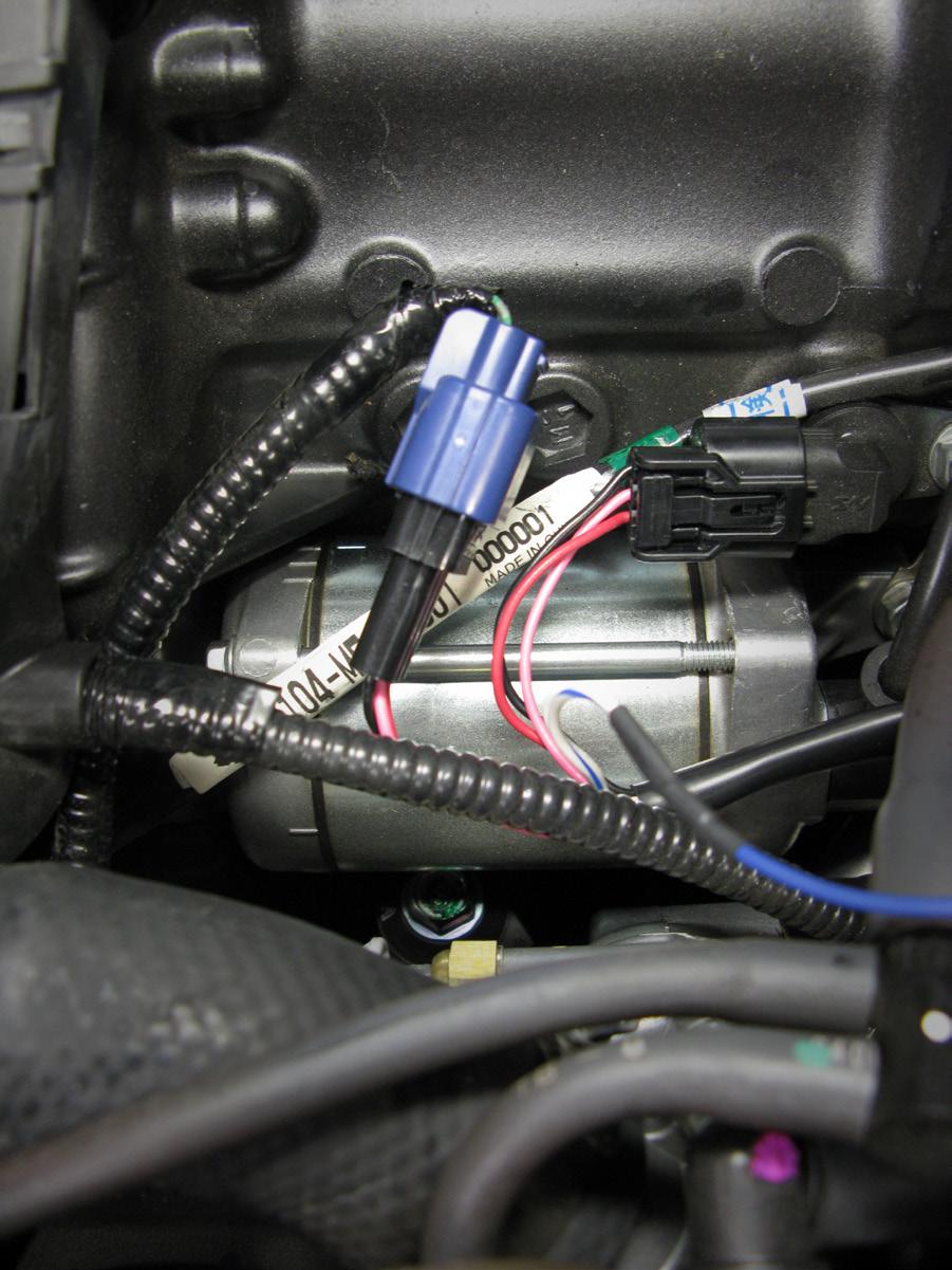 attached to the lower half of the airbox before being removed in step 3). 2. Disconnect the factory CKPS connectors. 3. Connect the Bazzaz CKPS connectors in-line with the factory connectors.