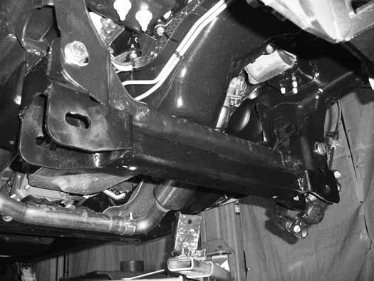 Install the new rear crossmember (02083) in the rear lower control arm frame pockets and fasten with new 18mm x 150mm bolts and washers (BP 773). Do not put nuts on at this time.