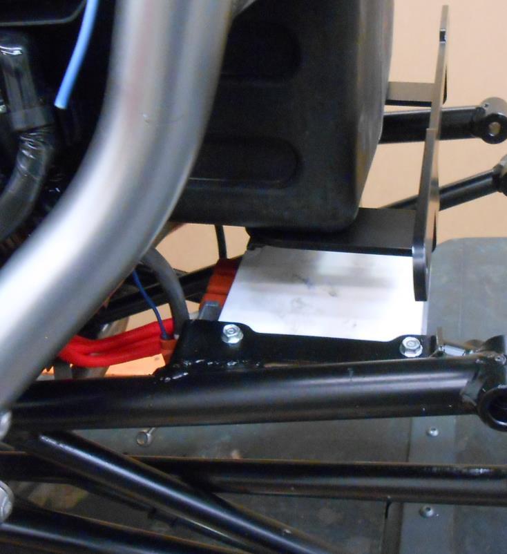 *Kits with Auxiliary Fuel Tanks, begin installation here before beginning reassembly. Refer to separate instructions provided. Frame Mount Installation: 1. Install new CSC rear Brake Line.
