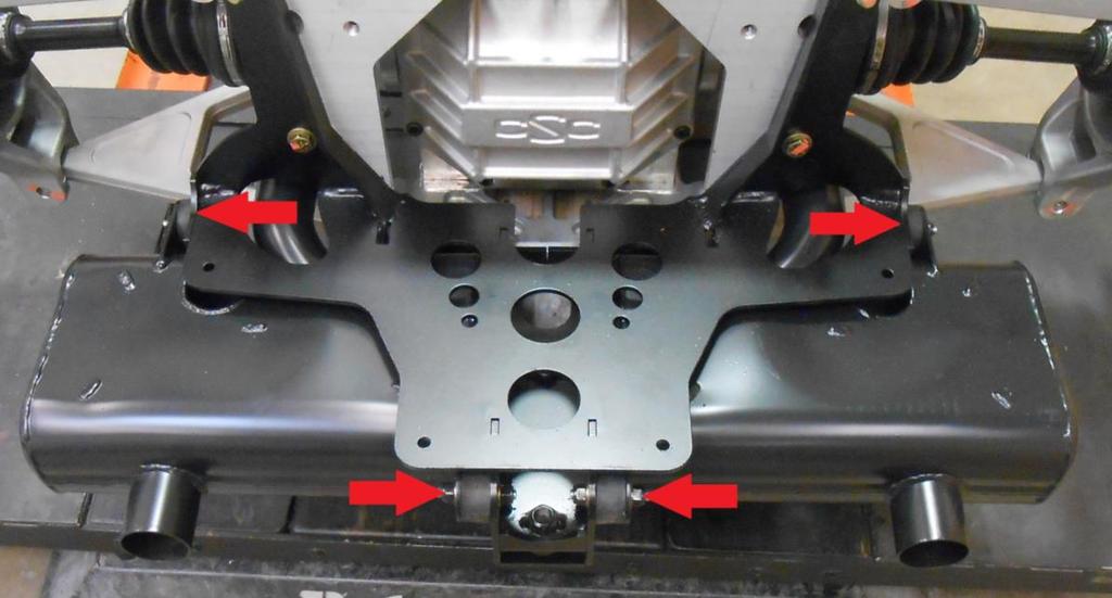 Install the 4 rubber sandwich mounts with flat washers and nyloc nuts to the Body Frame. Refer to RED ARROWS.