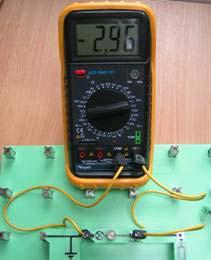 Connect a multimeter to read the voltage across the bulb. (A Multimeter Help Sheet is available if you are unsure how to do this.) 5.