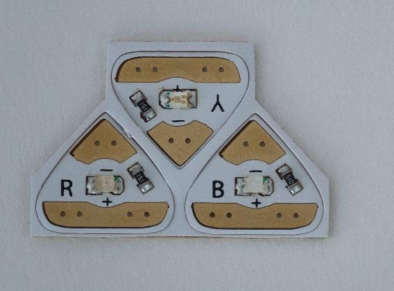 The Chibitronic stickers are polarized so one side needs a positive connection and the other side needs a negative connection.