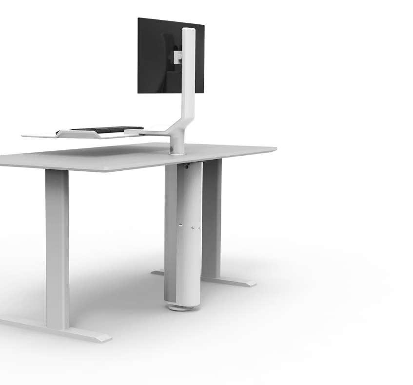 QUICKSTAND UNDER DESK QuickStand Under Desk allows users to seamlessly alternate between sitting and standing postures without interrupting workflow.