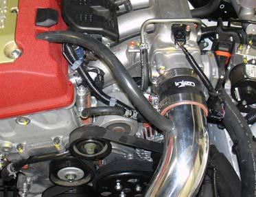 < Figure 36 Press the Injen air filter over the end of the secondary intake located in