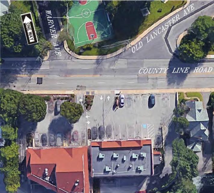 County Line Road Corridor Transportation Evaluation March 2019 along the north side of the shopping center building in both directions; given the narrow width of the driveway (approximately 10 wide),