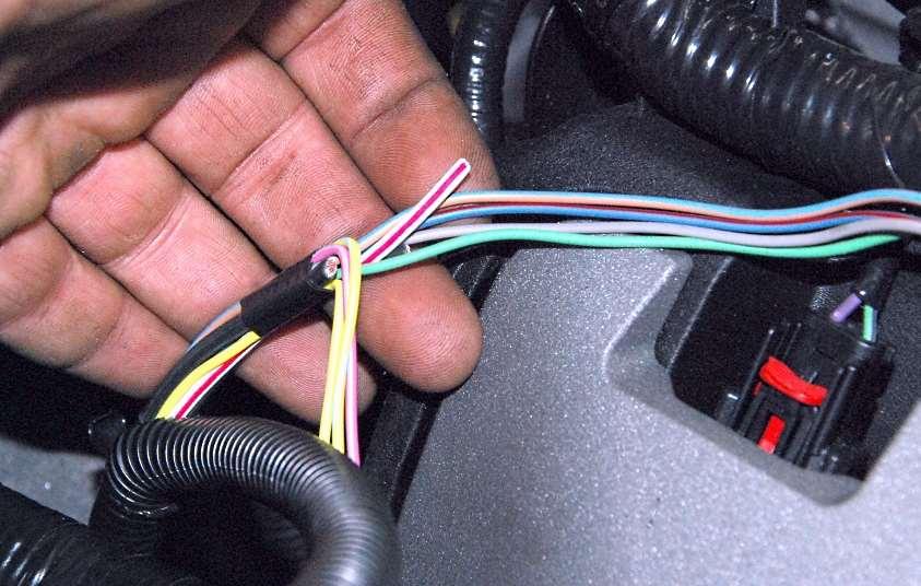 Intercooler wire Cut the white/red Intercooler pump wire as far back in the harness as you can. It is not needed or used. Power Distribution Wire cutters/strippers, electrical tape, wire crimpers.