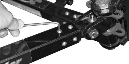 Remove eight fasteners from receiver end of connecting leg and slide rail tube off of front clevis