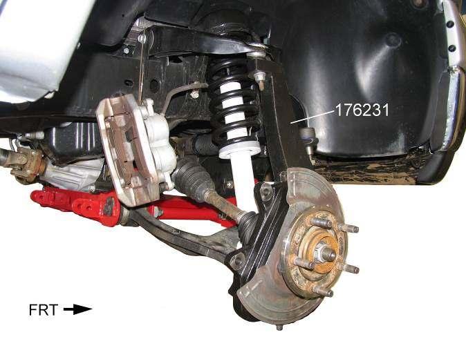 4) Remove the brake hose banjo bolt at the caliper. Remove brake hose. Illus. 23 8) Tighten the upper ball joint nut to 40 ft. lbs.
