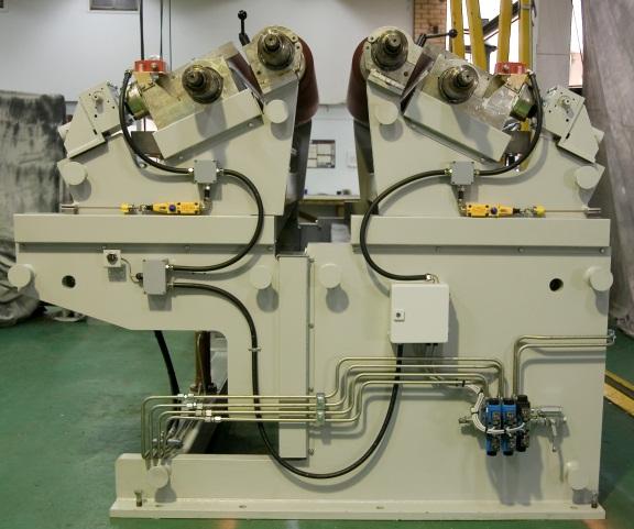 C-Wrap Coater Machine: This machine is also a modification of the S-Wrap Coater Machine. It operates in a similar manner to the U-Wrap Coater Machine in that it is also a Quick Change Coater.