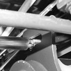 IMPORTANT: The cotter pin must be located along the inside edge of the tractor frame. 5.