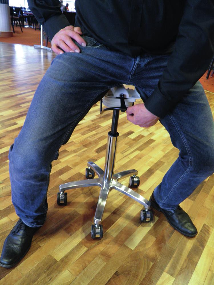 Adjusting the seat higher is achieved by lightening the user s weight onto one s feet and pulling the height adjustment lever upwards. Release the lever when the height is optimal.