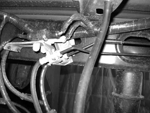 Using C-clamps, clamp the leaf spring pack together on each side of the center pins. Remove the center pins and discard. 90.