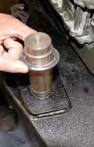 Repeat same steps for remaining bolts. Tighten down with 18mm socket and 19mm wrench.