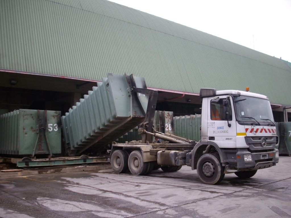where the plant manager instructs them into which compactor to discharge their load. There are traffic lights on the front of the three unloading bays.