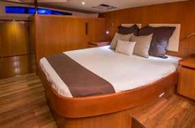 natural wood look STATEROOMS Large windows offering excellent view Dedicated hanging lockers Ample storage lockers Custom blinds fitted on cabin hull windows Concealed shade blind and insect screen