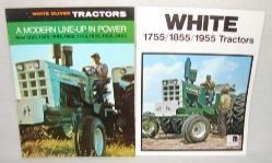 2-110 tractors; 2 White  Set of 4 belt buckles; 1