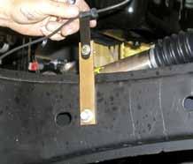 Install the OEM bump stop cup to the bottom of the new bracket using the 3/8" x 1 fine thread bolt, washer, & nut. Note: Do Not use a washer under the bolt head.