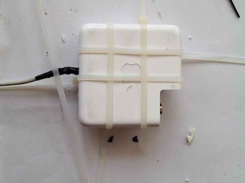 Don't forget the plastic tabs that let you wrap your cable on the charger.