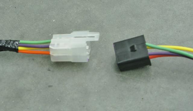 For 1968-78 applications install the red wire with the black connector from the new harness into an open slot on the fuse block labeled battery.