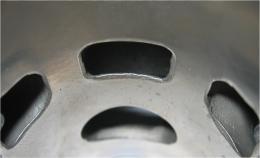 inlet passage and exhaust port and passages. All ports have chamfered edges to prevent ring snagging.