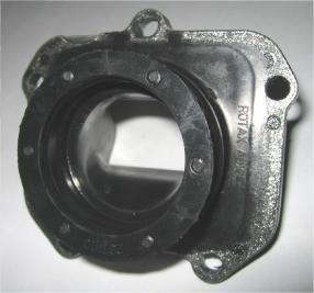 The exhaust port may show partial manual grinding done by the manufacturer to eliminate minor casting defects and to eliminate the NIKASIL burr at the end of the NIKASIL plating.