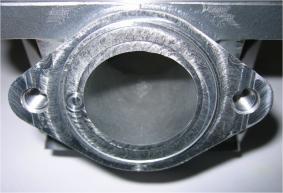 3 The sealing flange for the exhaust socket may show either cast finish surface or signs of machining from the manufacturer. 10.5.7.
