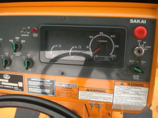 Controls are straight forward. The throttle switch below the key switch indicates a Tier 3 engine.