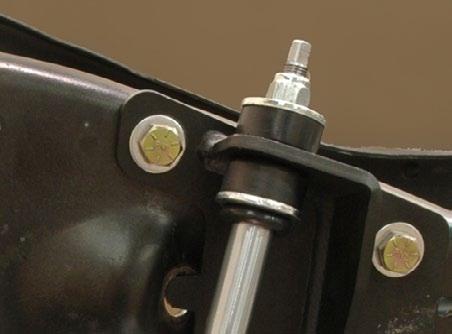 19. Press the domed shock stud into the bushing until fully seated.