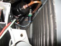 coil to cool the refrigerant flowing through the system.