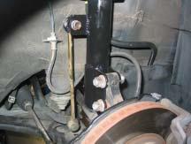 Also, be sure to strap or support the rear suspension to prevent the struts from pulling apart.