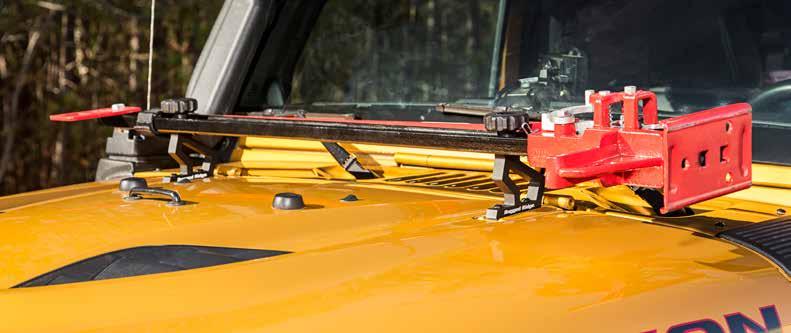 HOOD MOUNT OFF-ROAD JACK HOLDER The only thing more important than having an off-road jack on your Jeep is being able to access it when the need arises.