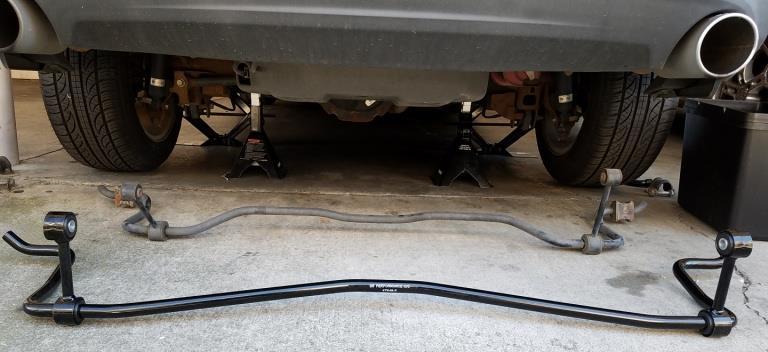 Install with open side of the bushings facing upward (the two ends of the sway bar should curl towards the front of