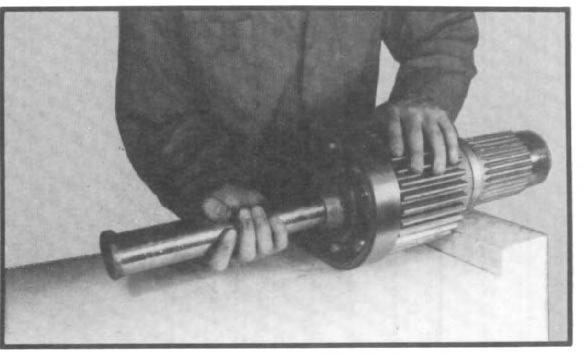 Use care to prevent damage to direct drive gear as shaft pulls free. (See fig. 79