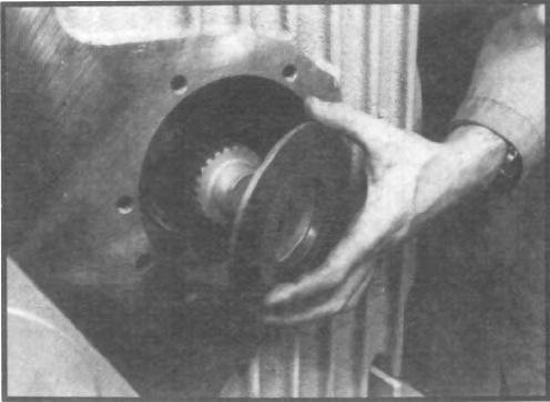 Install lower shaft assembly into housing through rear bore. (See fig.