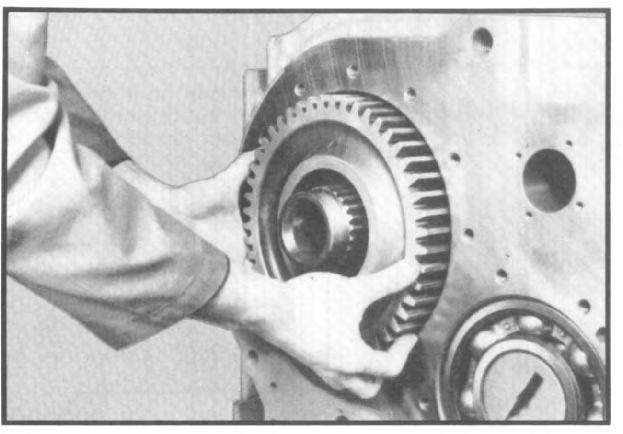 VII. TRANSFER CASE ASSEMBLY 2.10 Install direct drive gear through the rear case bore and onto rear of shaft with clutch face inwards. (See fig. 119.